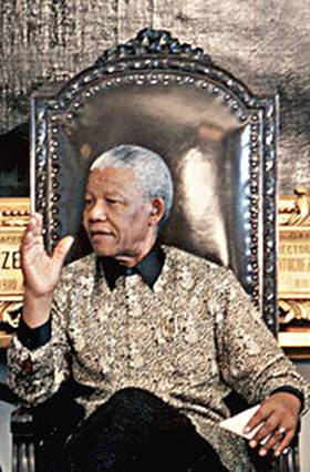 http://upload.wikimedia.org/wikipedia/commons/thumb/f/fe/Nelson_Mandela_1998.JPG/198px-Nelson_Mandela_1998.JPG